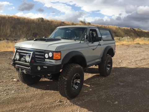 1988 Ford Bronco - This modified Ford Bronco sits high on large tires, ready for off-road adventure.