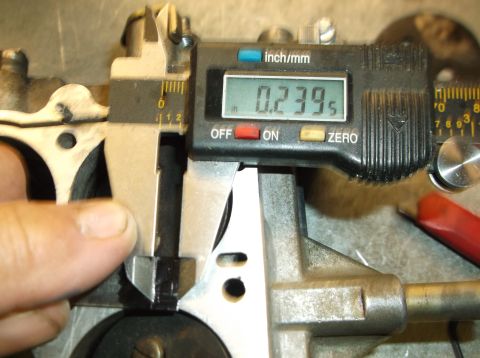1979 Ford Ranchero - A digital caliper is used to measure a component to 0.239 inches.