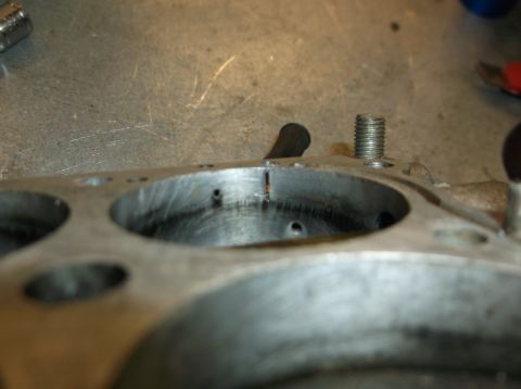 1979 Ford Ranchero - This image shows a close-up view of an engine component, possibly a cylinder head, exhibiting signs of wear and scoring.