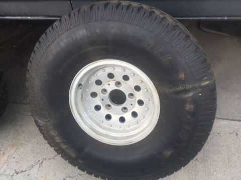 1986 Ford Bronco - A single tire and wheel assembly is shown, likely for an off-road vehicle.
