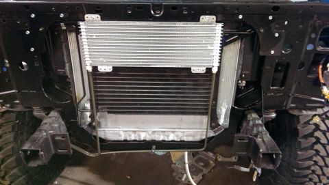 1995 Ford Bronco - Front view of an engine oil cooler and radiator assembly, likely part of a custom build or repair.