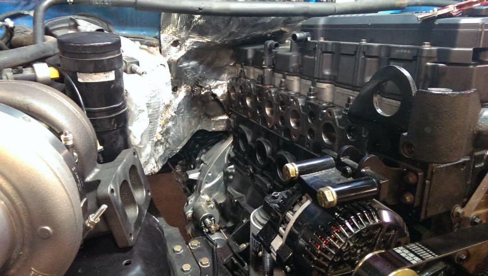 Engine with turbocharger and exhaust manifold