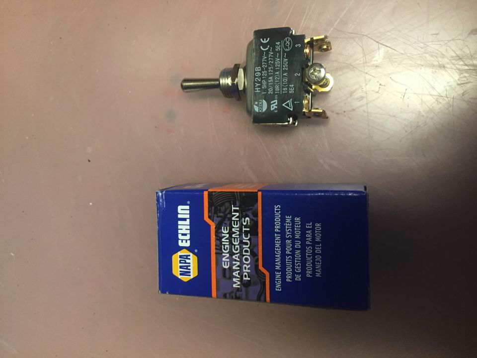 Toggle switch and NAPA Echlin engine management products box.
