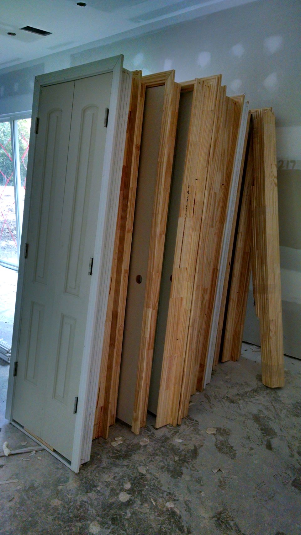 I didn't see when the doors & trim were delivered, but there was one with the wrong hinges, and another was damaged.