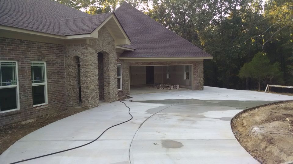 I'm wetting all the concrete down about every other day, and it's hard to keep it all wet because it drains so well.