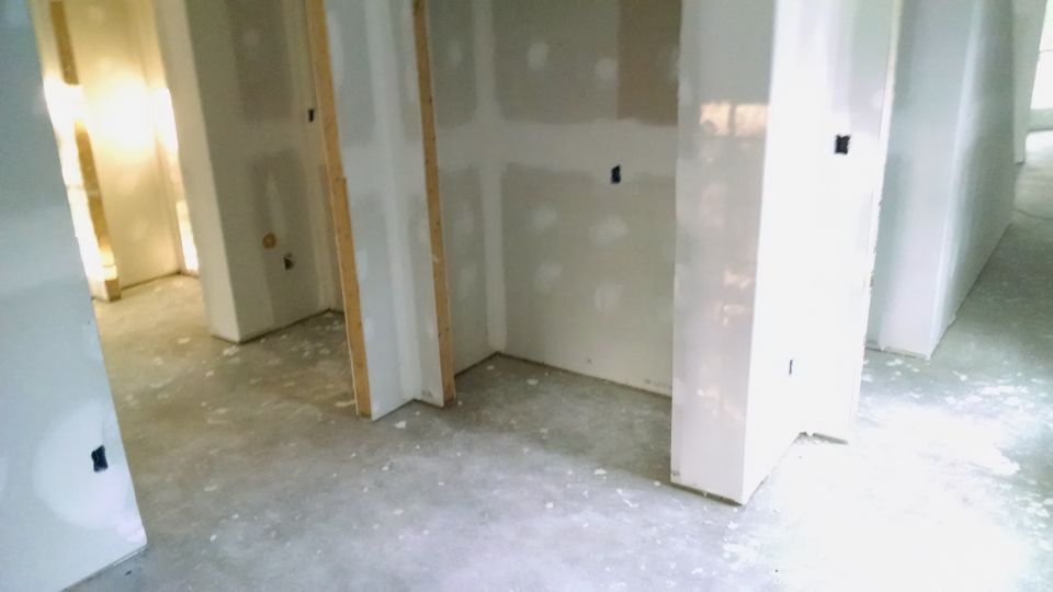 Bedroom 2 looking northeast.

I spent ~6hrs today sweeping & leaf-blowing the house out, including the wall boxes.  The trash can was almost too heavy for me to lift into the dumpster.