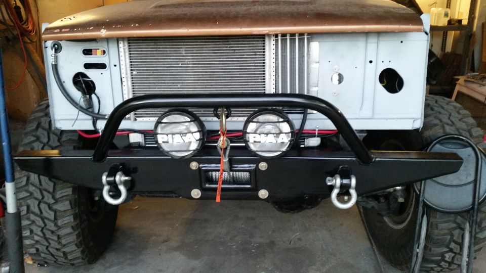 1979 Ford Bronco with custom front bumper, winch, and PIAA lights.