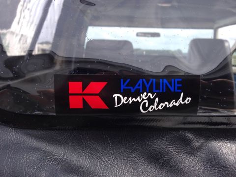 1979 Ford Bronco - A sticker reading KAYLINE Denver Colorado is affixed to the rear window of a vehicle.