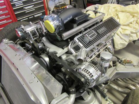 Polished engine with 496 valve cover and Edelbrock intake.