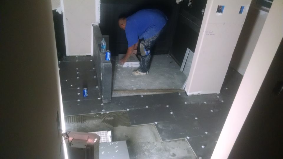 Somehow, they ran out of tile for the master bathroom floor.