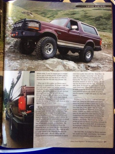 1996 Ford Bronco - A maroon 1996 Ford Bronco is shown off-road on a rocky incline, featuring large off-road tires and a custom front bumper with lights. The v…
