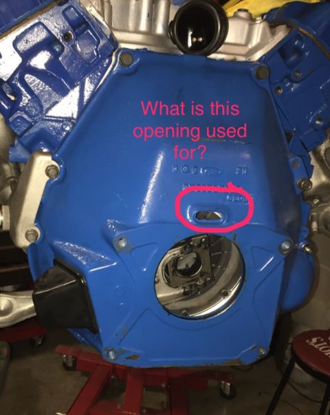 1978 Ford Bronco - A blue engine block is shown with a question about a specific opening, indicating a part being examined.