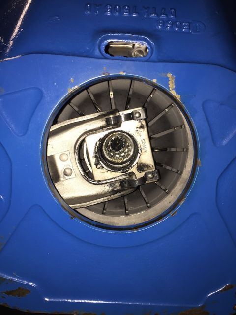 1978 Ford Bronco - Internal view of a vehicle's mechanical component, showing a complex assembly within a blue housing.
