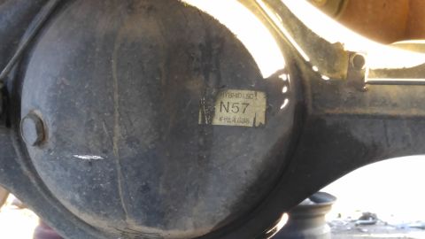 2002 Mitsubishi Montero Sport - Close-up of a vehicle differential housing showing a part identification sticker.