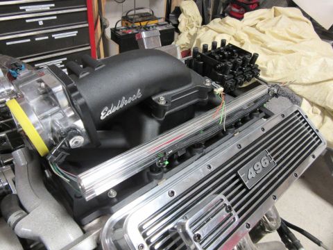Engine block with Edelbrock intake manifold and "496" valve cover