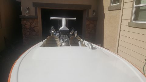 1970 Ford Five Hundred - View from the bow of a boat showing the engine, seats, and a T-bar structure.