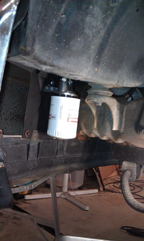 1995 Ford Bronco - Aux transmission filter, left front fender area.