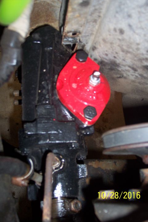 1973 Ford F-250 - A close-up view of a black steering gear box with a red cap and silver bolt on top. The date 10/28/2016 is visible in yellow text in the lo…
