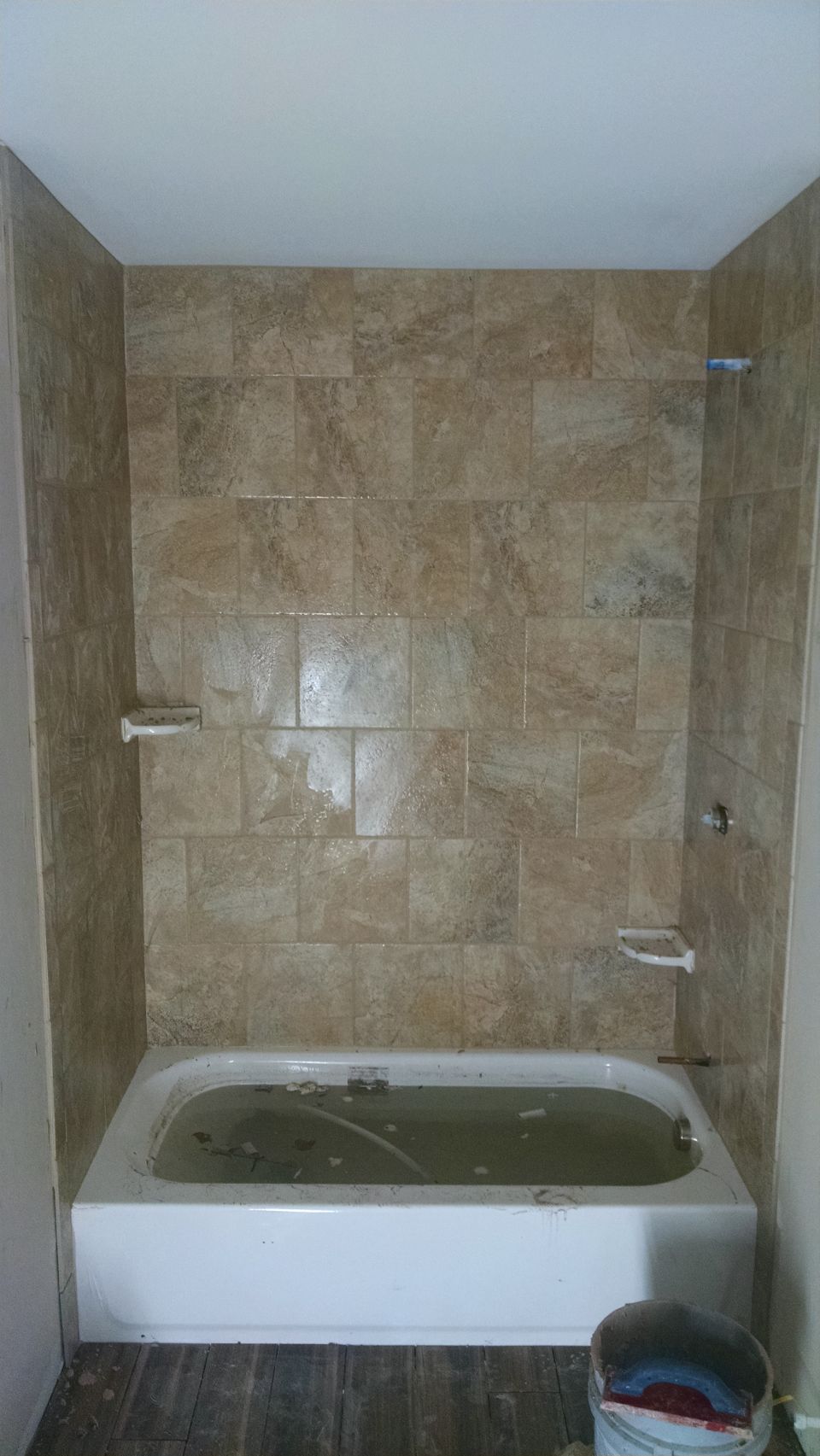 These are backward - we want the high shelf near the shower, and the low shelf away.