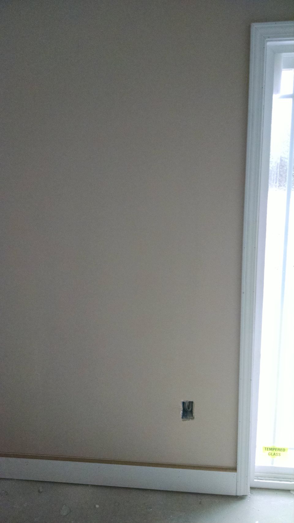 After cabinets, trim work began.  The baseboard has a simple quarter-round routed onto it, and there will be a quarter-round shoe mould.