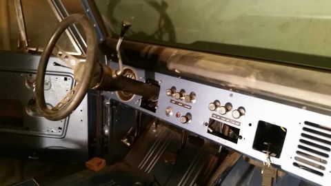 1973 Ford Bronco - The interior of a 1973 Ford Bronco shows its dashboard and steering wheel during a restoration process.