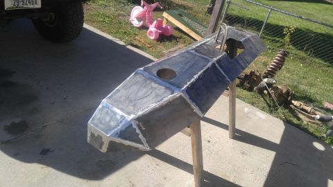 1991 Ford Bronco - A custom-fabricated bumper, likely for an off-road vehicle, is shown supported by wooden sawhorses.