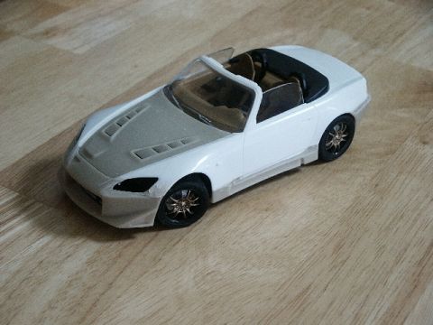 1998 Mercury Sable - This is a model car, not a 1998 Mercury Sable. It is shown from a three-quarter front view on a wooden floor.