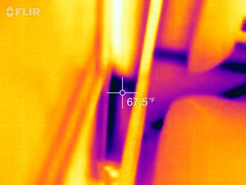 1995 Chevrolet P30 1 Ton - Step Van - A thermal image shows a close-up of a metal component with a temperature reading of 67.5°F displayed on a crosshair. The FLIR logo is visib…