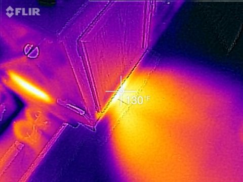 1995 Chevrolet P30 1 Ton - Step Van - A thermal image shows a hot spot of approximately 130 degrees Fahrenheit on what appears to be a metal surface. The FLIR logo is visible in…