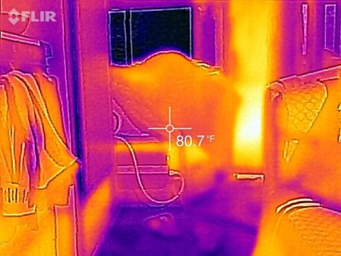 1995 Chevrolet P30 1 Ton - Step Van - This is a thermal image showing a close-up of an electrical outlet and a coiled cord. A temperature reading of 80.7°F is displayed on the s…