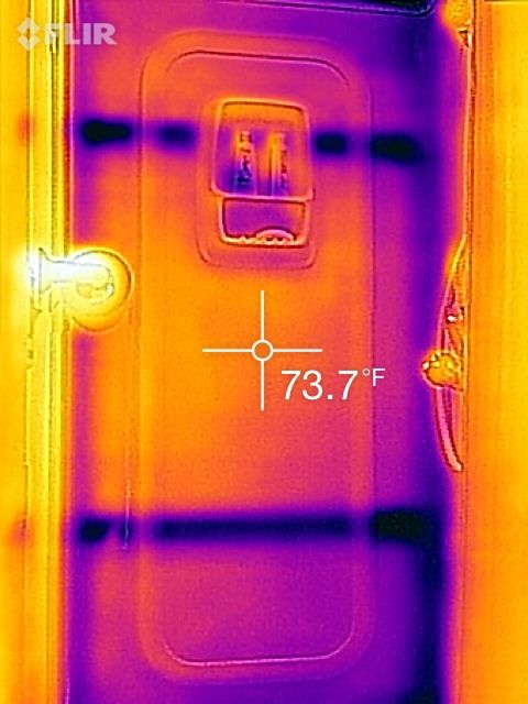 1995 Chevrolet P30 1 Ton - Step Van - FLIR thermal infrared image in orange and purple showing a doorway with a center crosshair reading 73.7 degrees Fahrenheit.