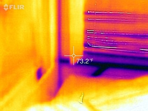 1995 Chevrolet P30 1 Ton - Step Van - FLIR thermal infrared image in orange and purple showing a temperature crosshair reading 73.2 F near a wall and baseboard.