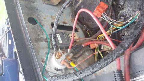 1984 Ford Bronco - Engine bay wiring and starter solenoid detail, not a 1984 Ford Bronco.