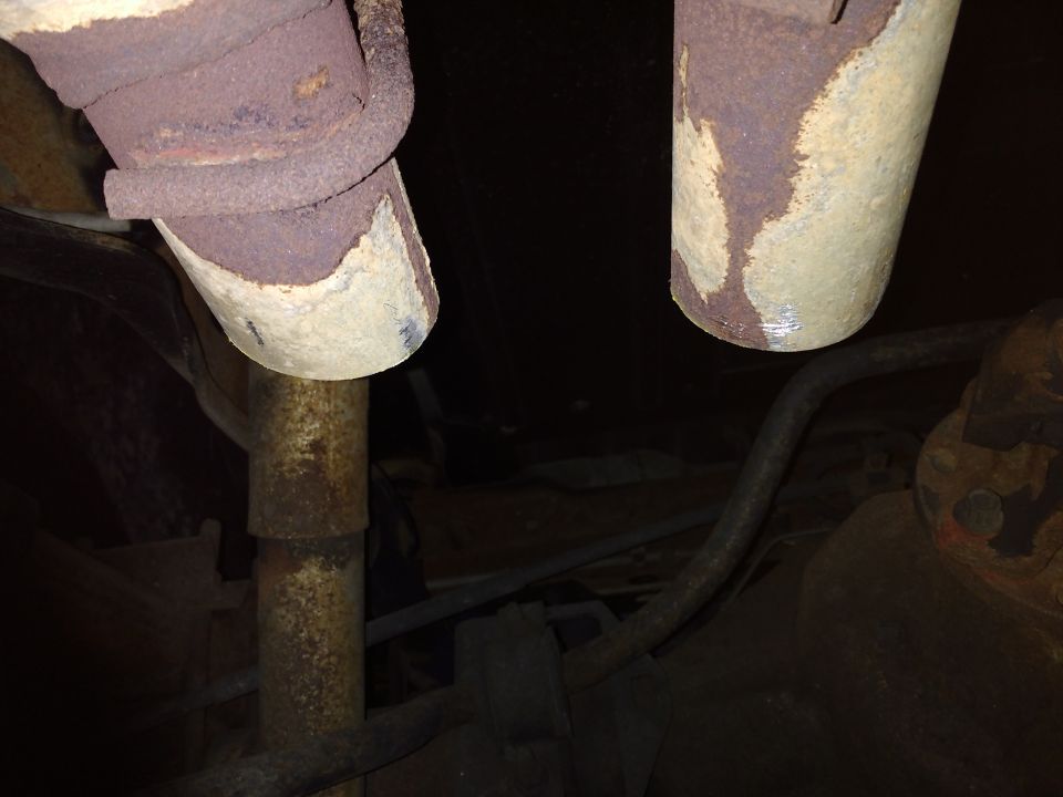 I bought the truck with a single in, dual out, Flowmaster 40 muffler. To make my project work a bit better, I cut off the downturn ends of the muffler.