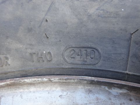 1995 Chevrolet P30 1 Ton - Step Van - Close-up of a tire sidewall showing the DOT code, which indicates the manufacturing date.