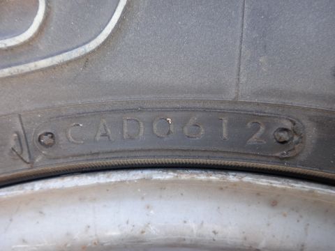 1995 Chevrolet P30 1 Ton - Step Van - The tire sidewall shows manufacturing codes, including 'CAD612'.