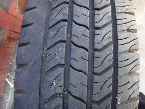 1995 Chevrolet P30 1 Ton - Step Van - A close-up view of a tire's tread pattern, with the Supermotors.net logo visible in the lower right corner.