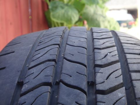 1995 Chevrolet P30 1 Ton - Step Van - Tire tread detail, showing the pattern of grooves and sipes.
