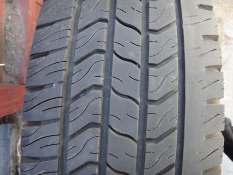 1995 Chevrolet P30 1 Ton - Step Van - Close-up of a tire tread with a watermark visible in the lower right corner.