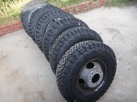 1995 Chevrolet P30 1 Ton - Step Van - Set of six BFGoodrich All-Terrain T/A tires, one showing a dually wheel.