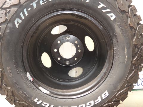 1995 Chevrolet P30 1 Ton - Step Van - Close-up of a BFGoodrich All-Terrain T/A tire and a black steel wheel.