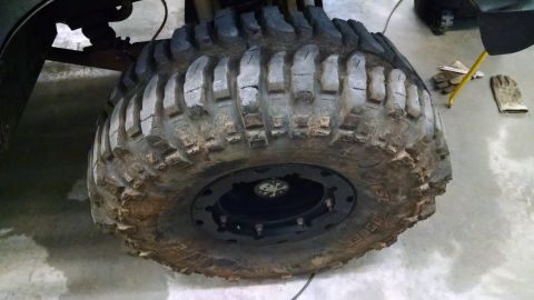 1995 Ford Bronco - This photo shows a close-up of a single off-road tire and wheel, not a 1995 Ford Bronco.