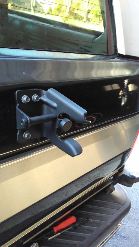 1996 Ford Bronco - Shaved off rust and repainted the tire arm holder.