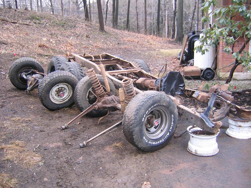 Just a frame, tires, axles, and misc parts.