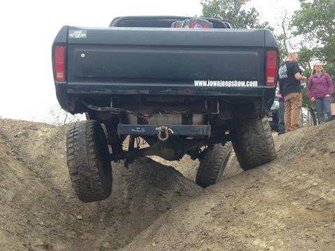 1979 Ford Bronco - This Ford pickup truck is navigating a challenging off-road terrain.