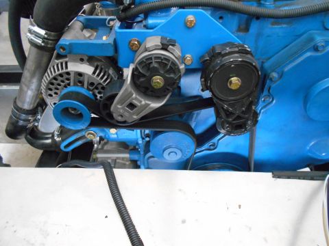 1992 Ford Bronco - Engine bay detail showing alternator, belt, and tensioner assembly.
