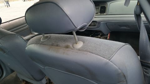 1991 Ford LTD Crown Victoria - Interior view of a 1991 Ford Crown Victoria LTD, focusing on the front seats and dashboard area.