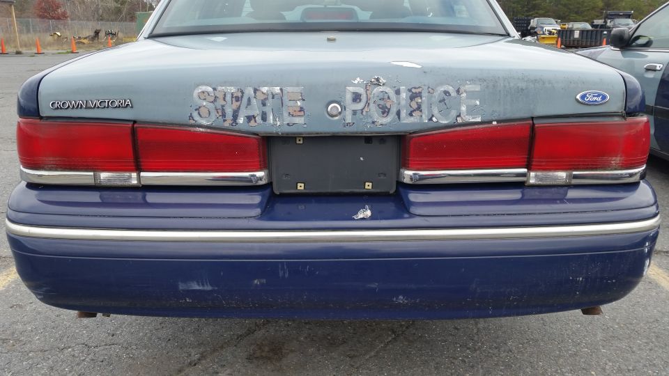 1991 Ford Crown Victoria LTD police car rear with 'STATE POLICE' text