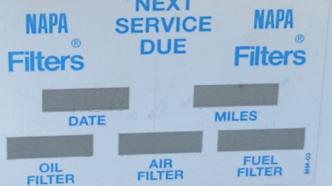 1991 Ford LTD Crown Victoria - Close-up of a blank NAPA Filters next-service-due maintenance reminder sticker, not a classifiable technical document.