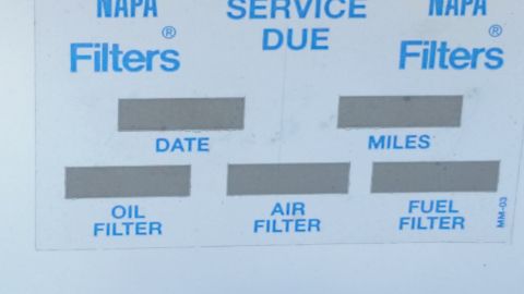 1991 Ford LTD Crown Victoria - Close-up of a blank NAPA Filters next-service-due reminder sticker, not a classifiable technical document.